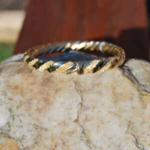 Gold twist bangle
