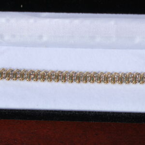 Gold tennis bracelet